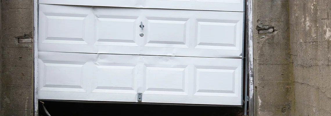 Garage Door Got Hit By A Car Dent Removal in Kissimmee, FL
